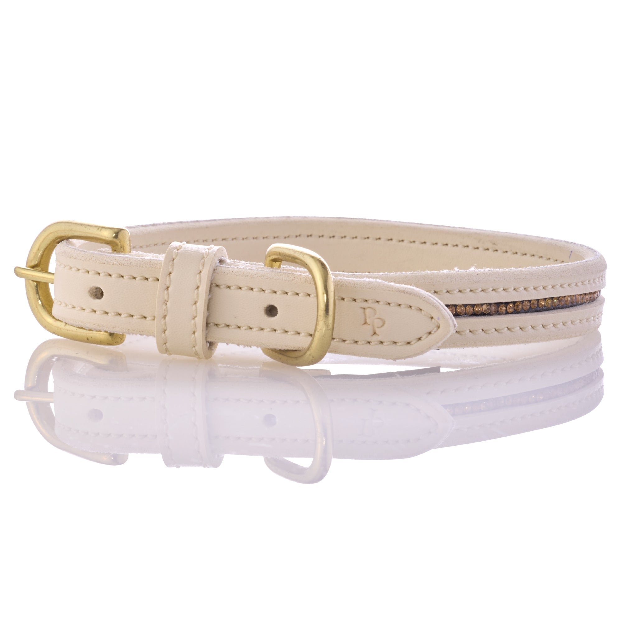 Beige leather dog collar with gold buckle on a white background