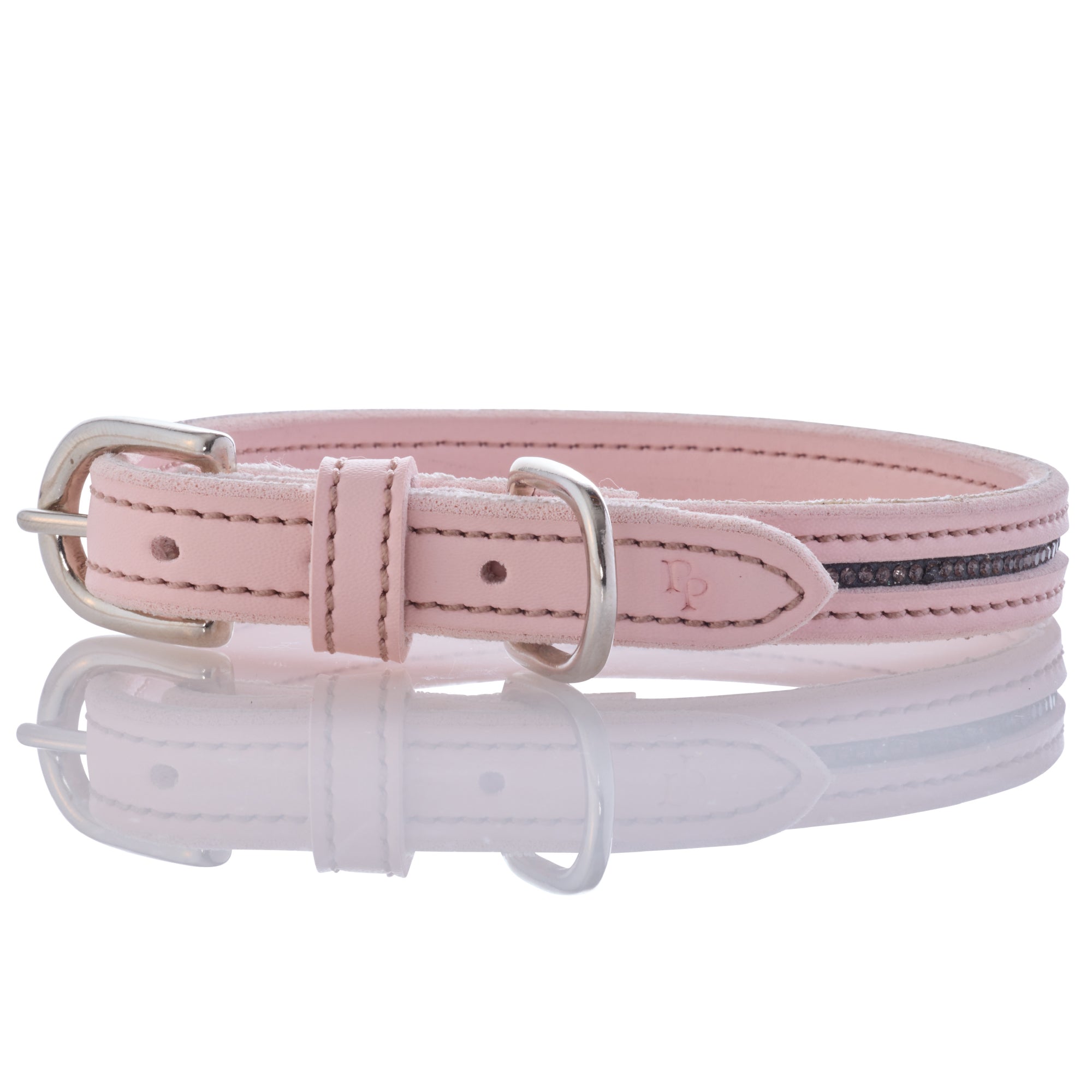 Pink leather dog collar with silver buckle on a white background