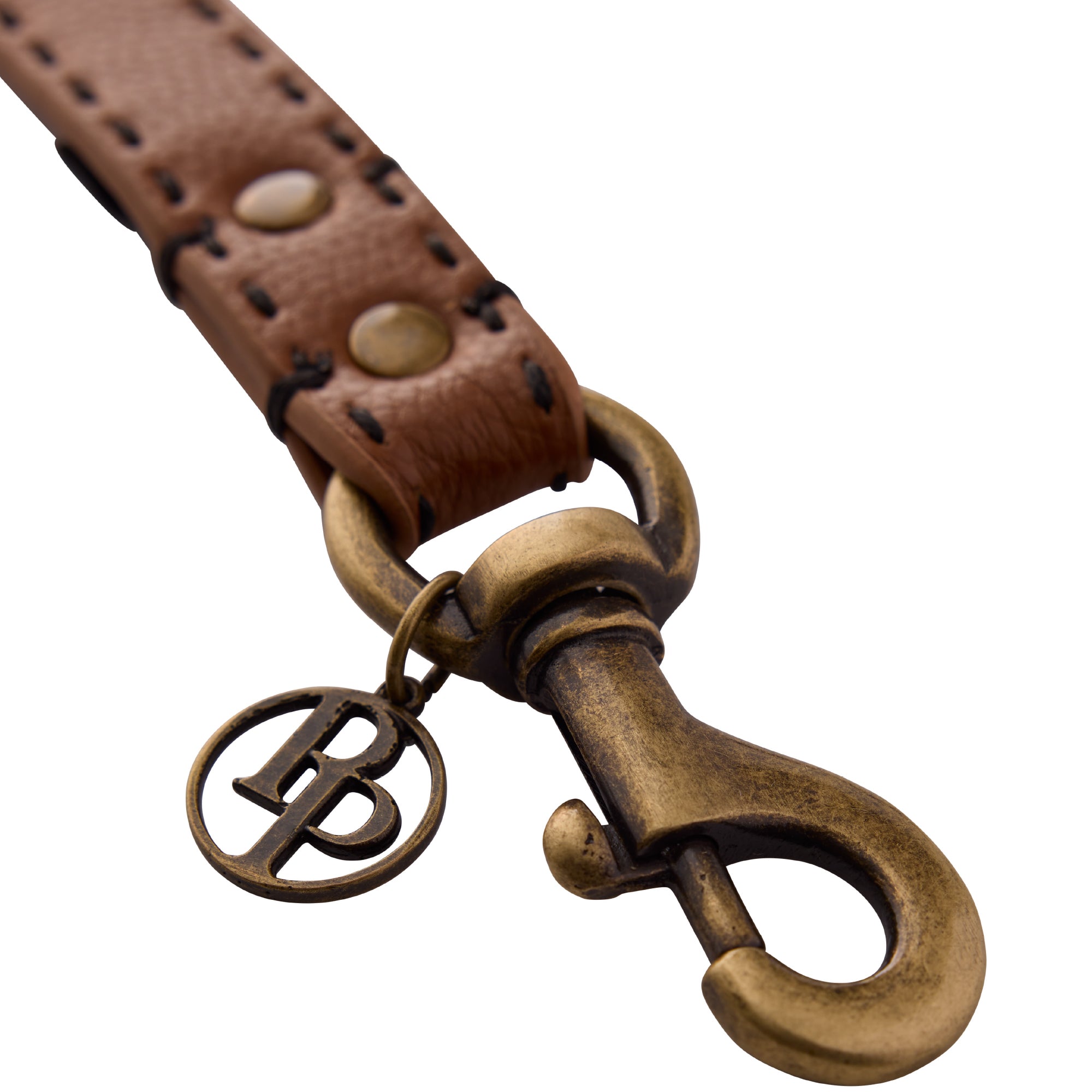 Close up of leash clip hardware and pet passion logo keychain