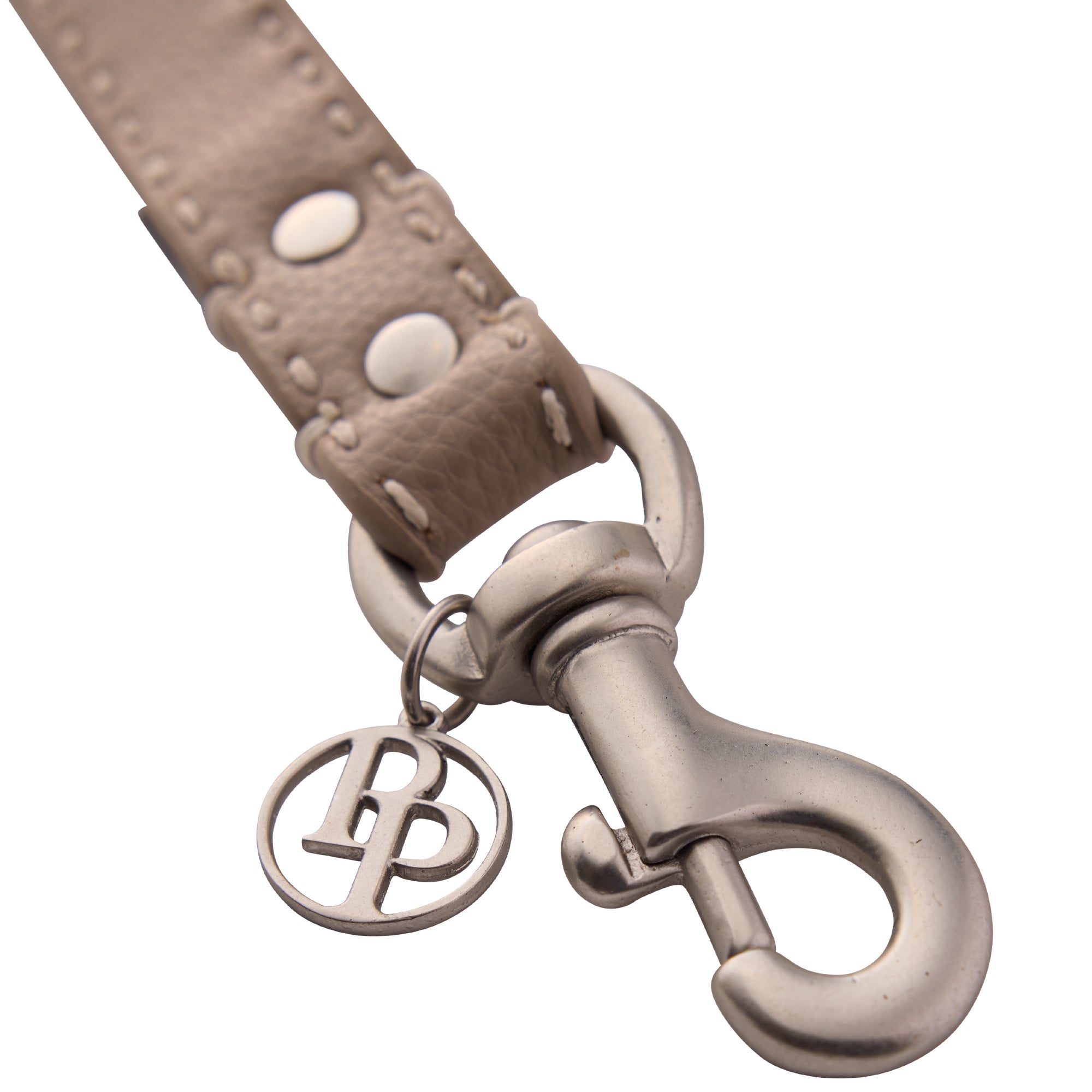 Close up of leash clip hardware and pet passion logo keychain