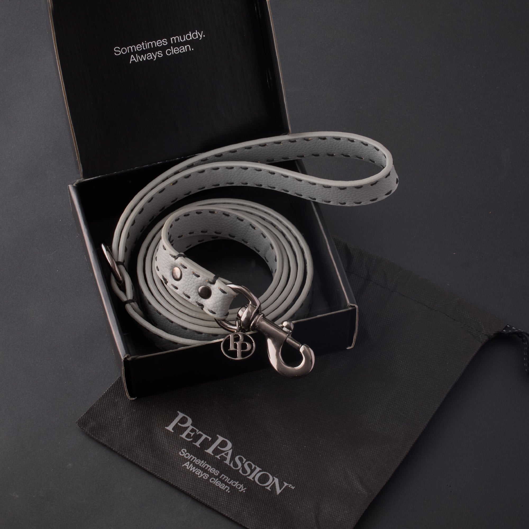 Display of leash packaging and Pet Passion garment bag