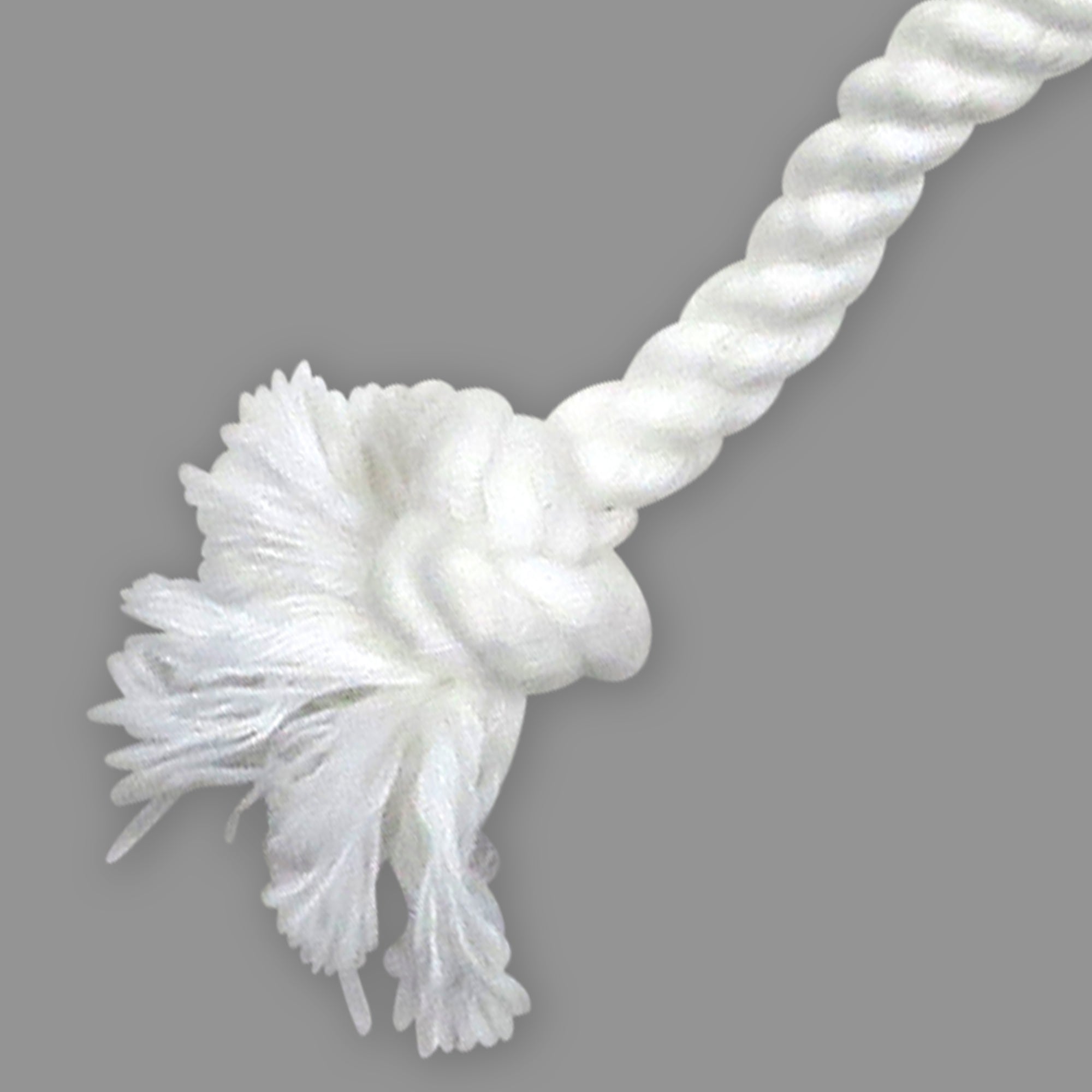 White rope toy with a knot on a gray background
