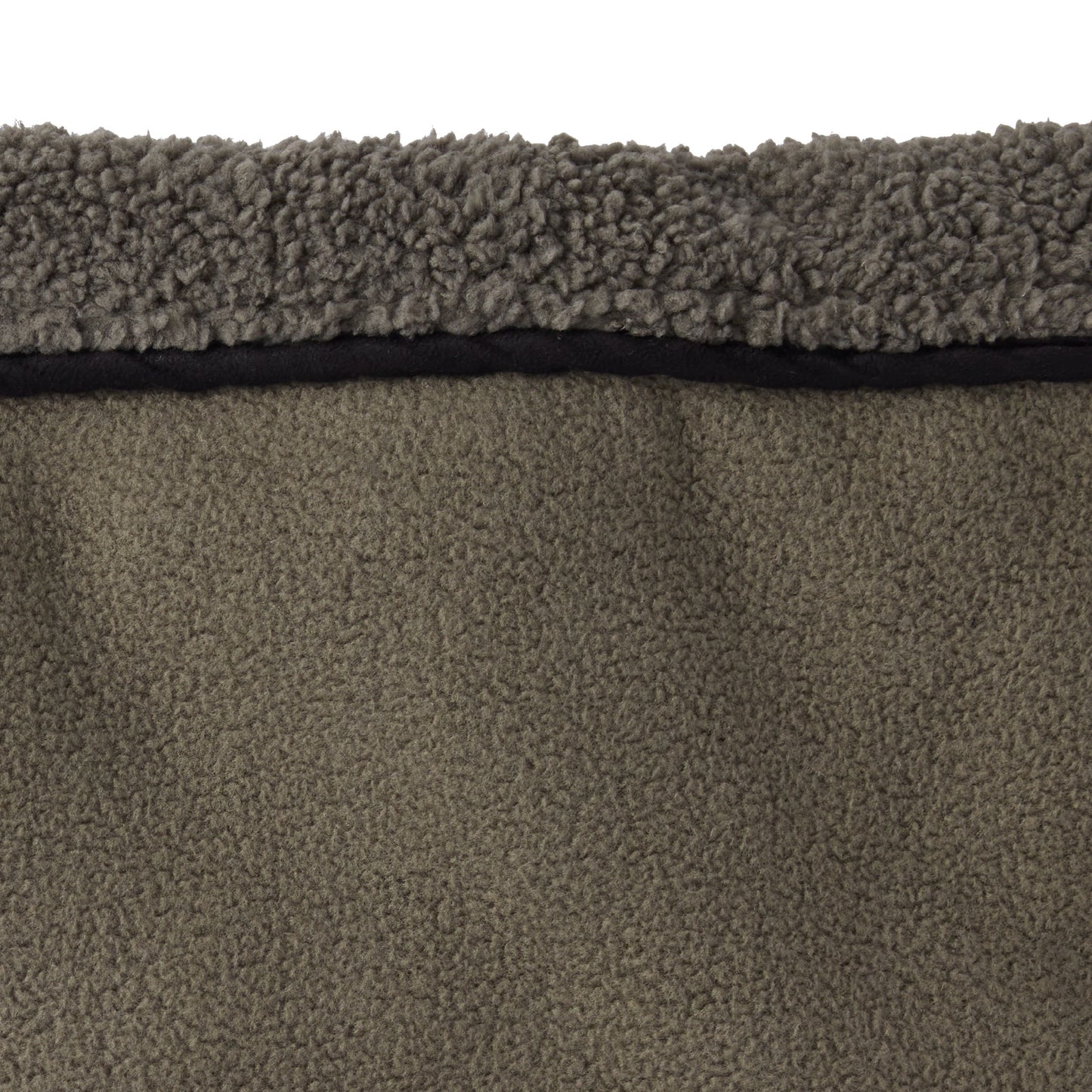 Close-up of a textured brown carpet with a visible border.