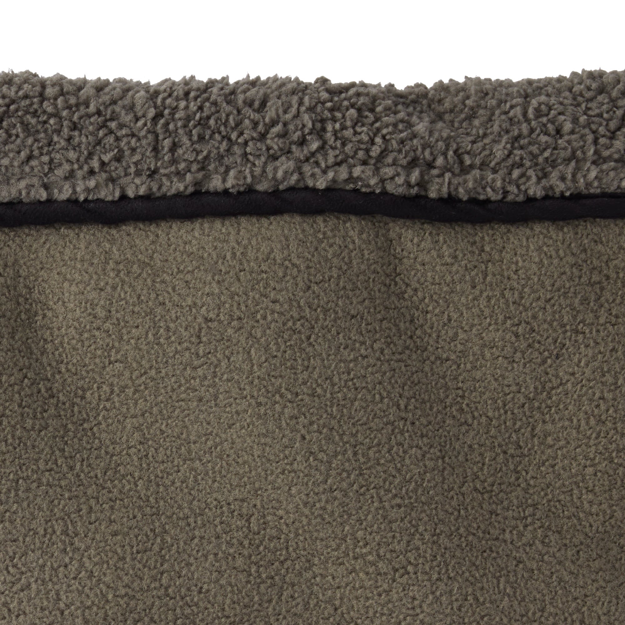 Close-up of a textured brown carpet with a visible border.