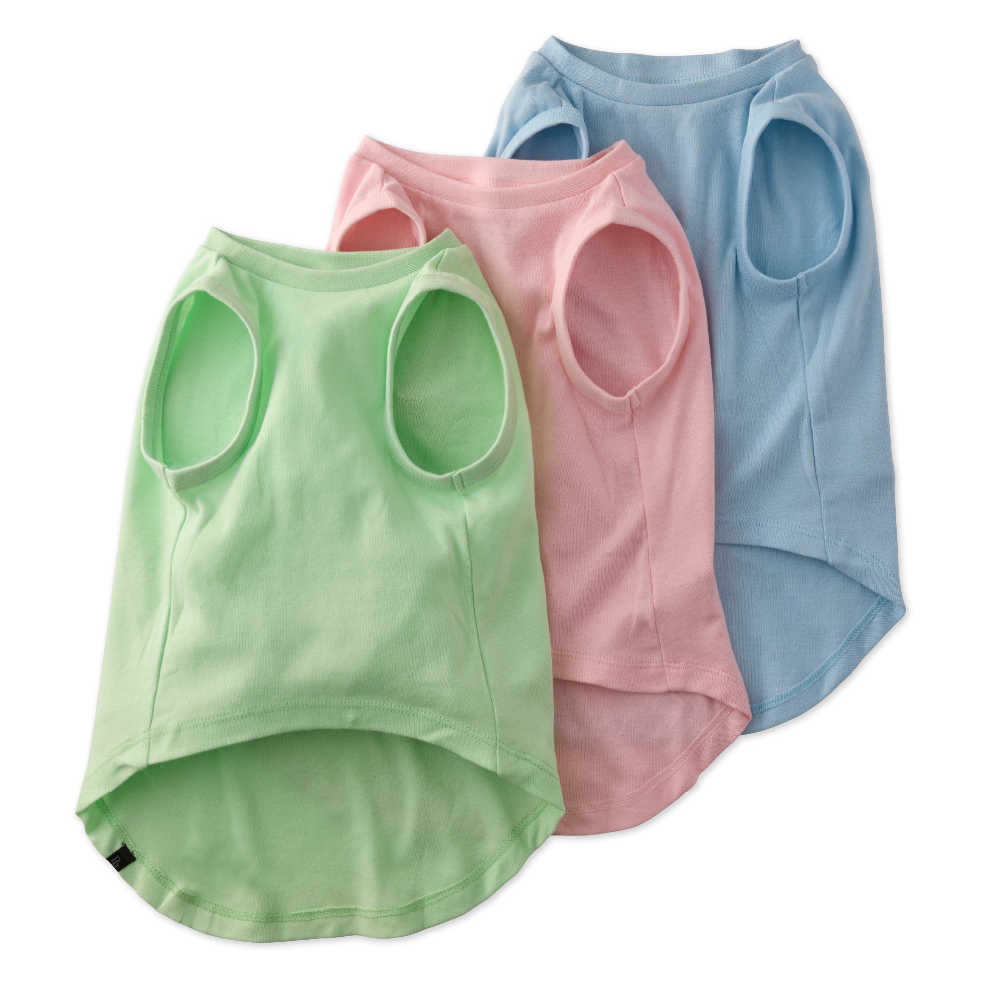 Three colorful tank tops in green, pink, and blue on a white background