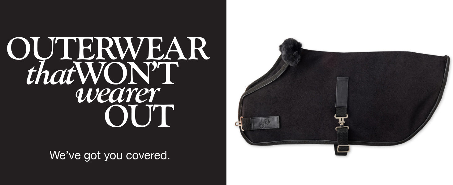 Black dog coat with text 'Outerwear that won't wearer out' on a black background