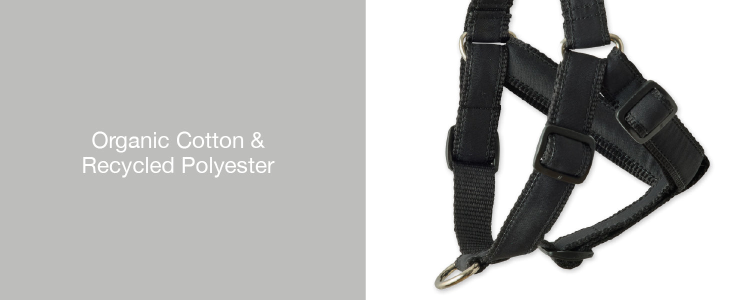 Black dog harness with 'Organic Cotton & Recycled Polyester' text on a gray background