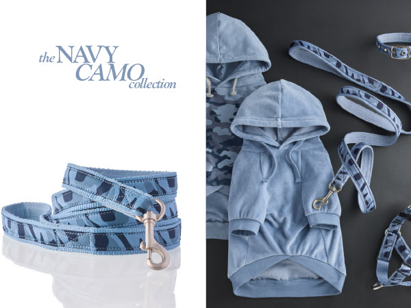Navy camo collection with a blue hoodie and matching leashes on a dark background.
