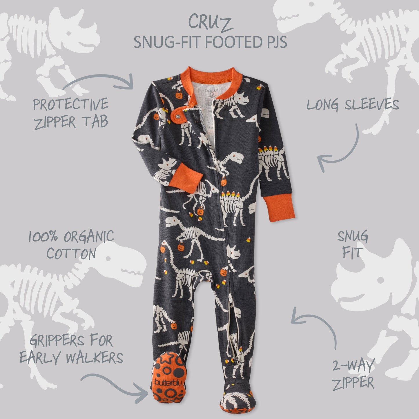Children's onesie with dinosaur pattern on a gray background with text detailing features.