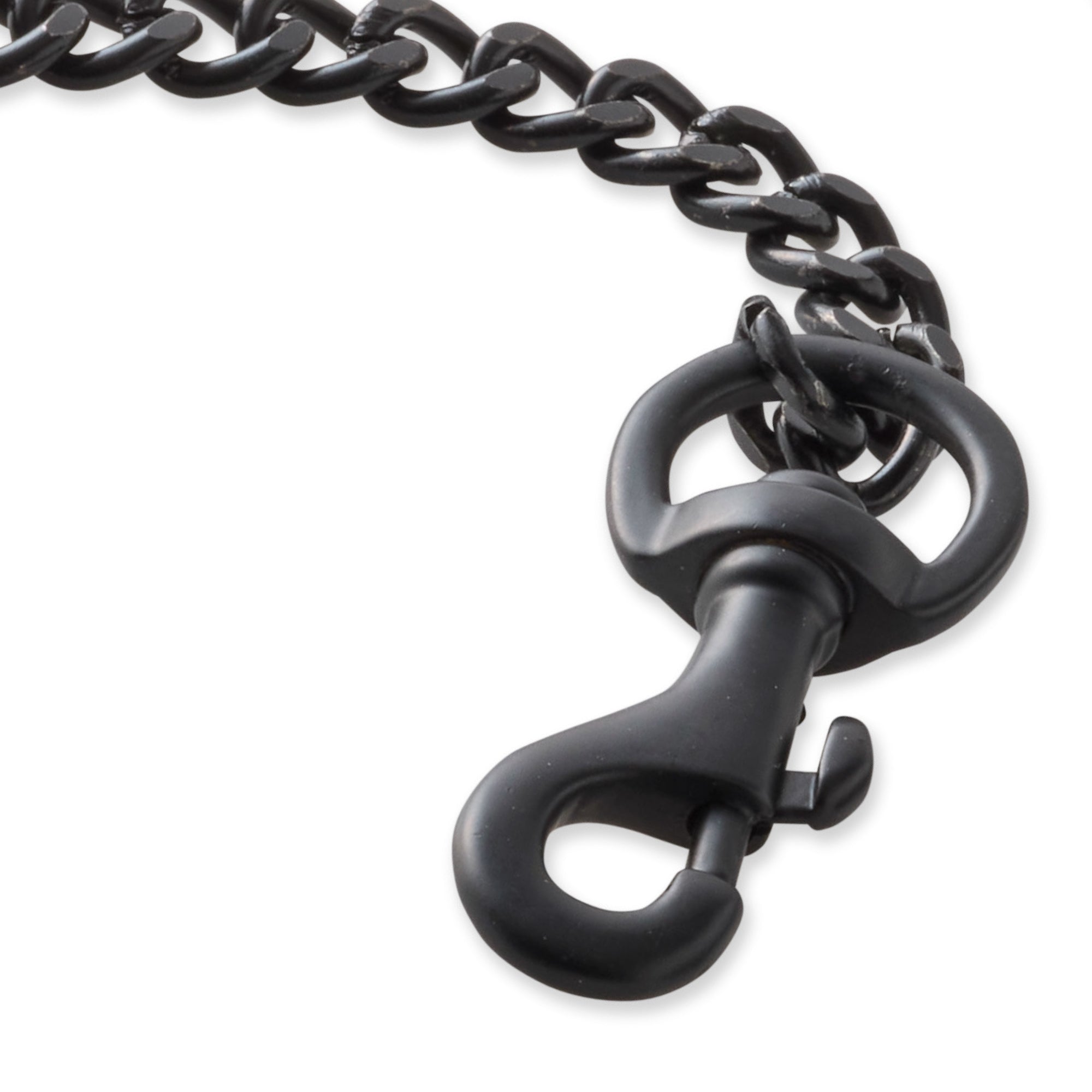 Close up of black Leash clip hardware and links on a white background