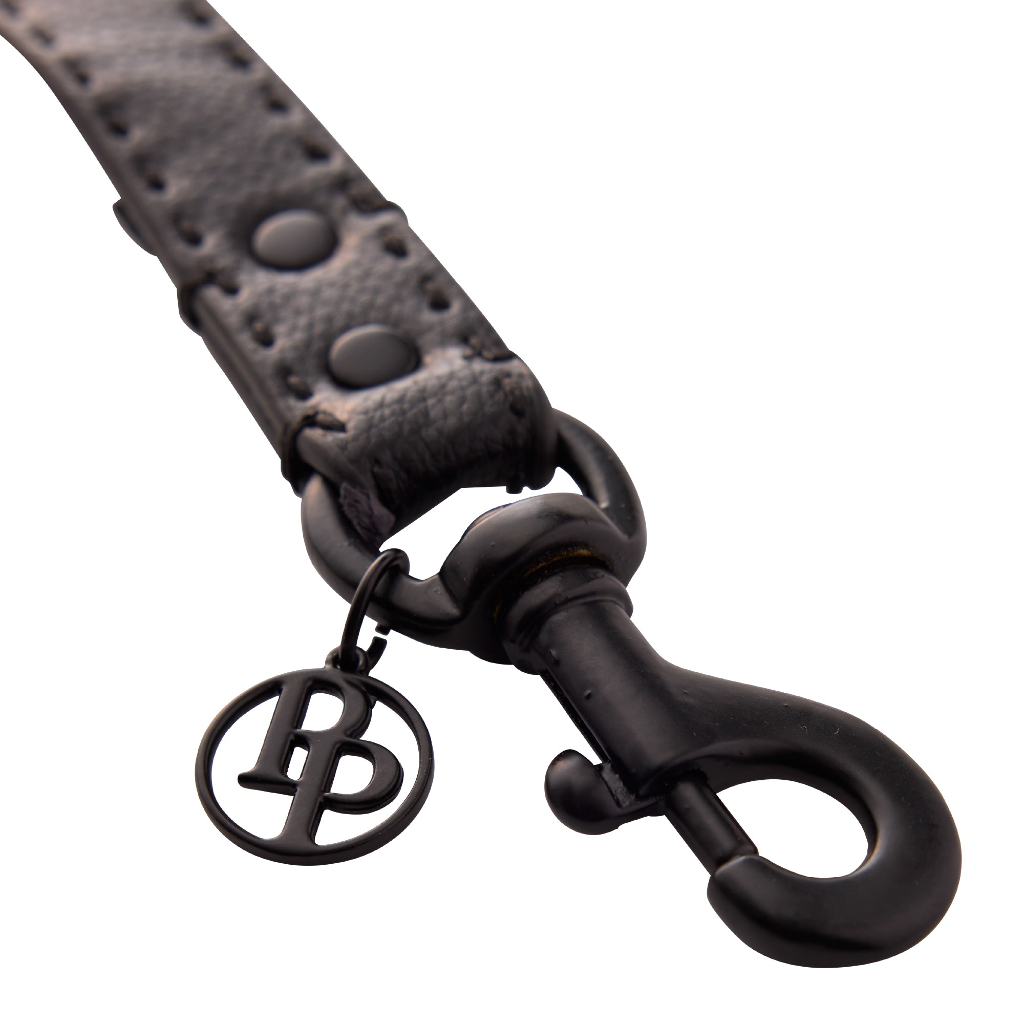 Close up of leash clip hardware and pet passion logo keychain