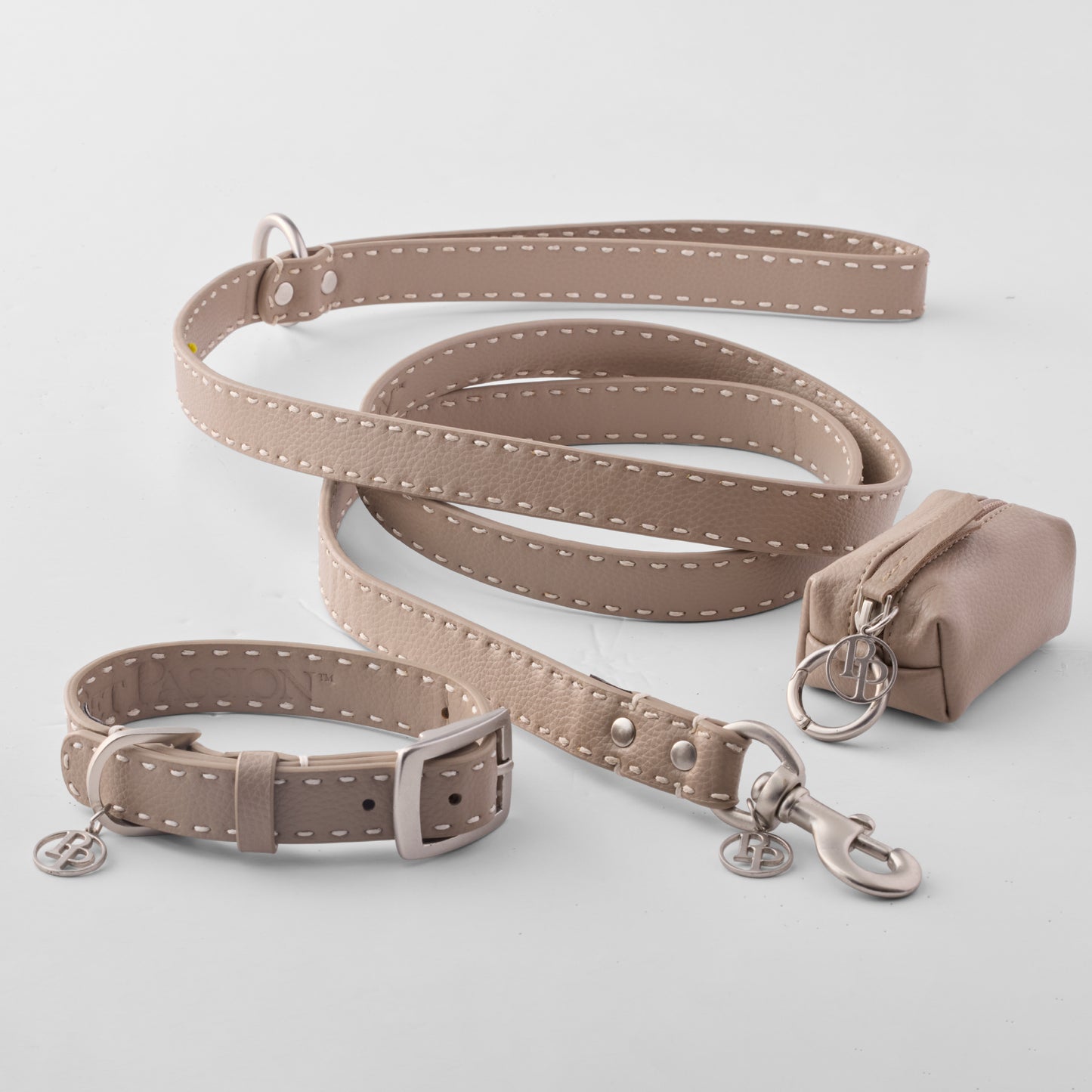 Layout of Rein collection including the Leash, Collar, and Caddy Bag in Dappled Cashmere 
