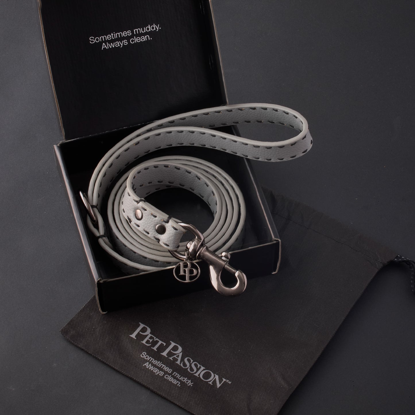 Display of leash packaging and Pet Passion garment bag