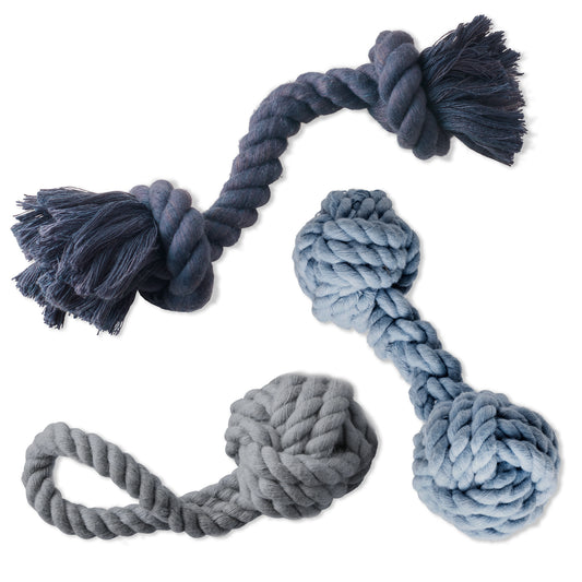 Dark blue, light blue, and grey rope toys on. a white background