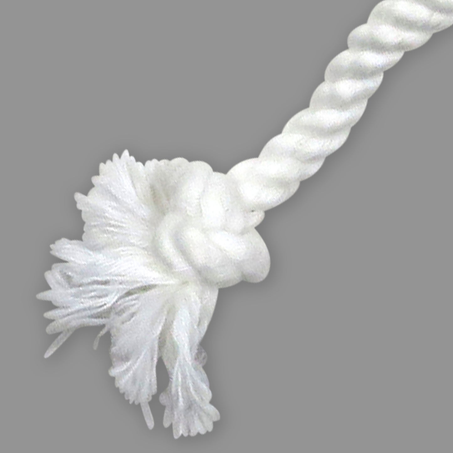 White rope toy with a knot on a gray background