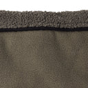 Close-up of a textured brown carpet with a visible border.