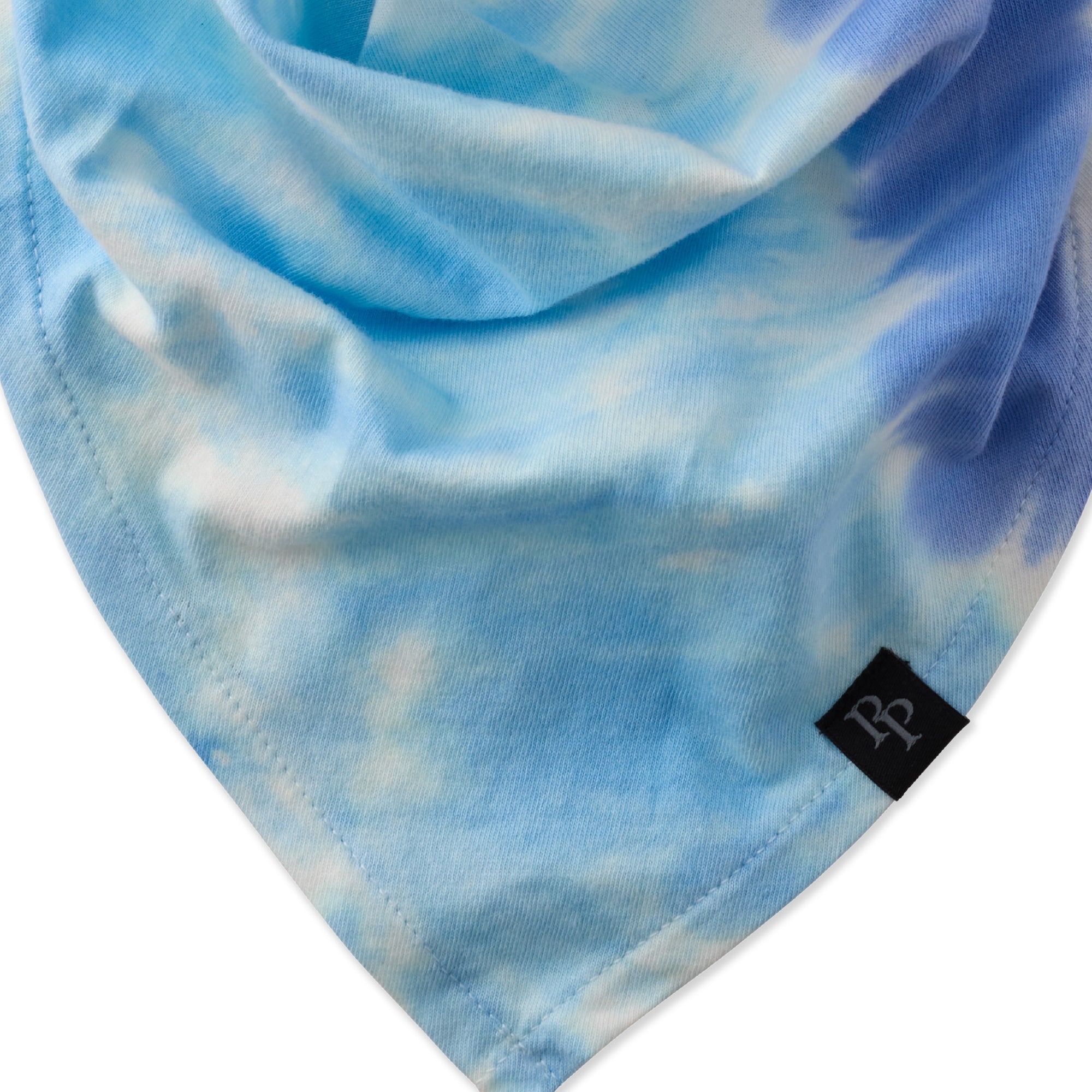 Blue tie-dye fabric with a brand logo on a white background