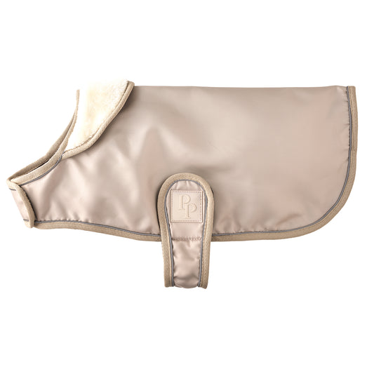 Sand colored dog windbreaker on a white background