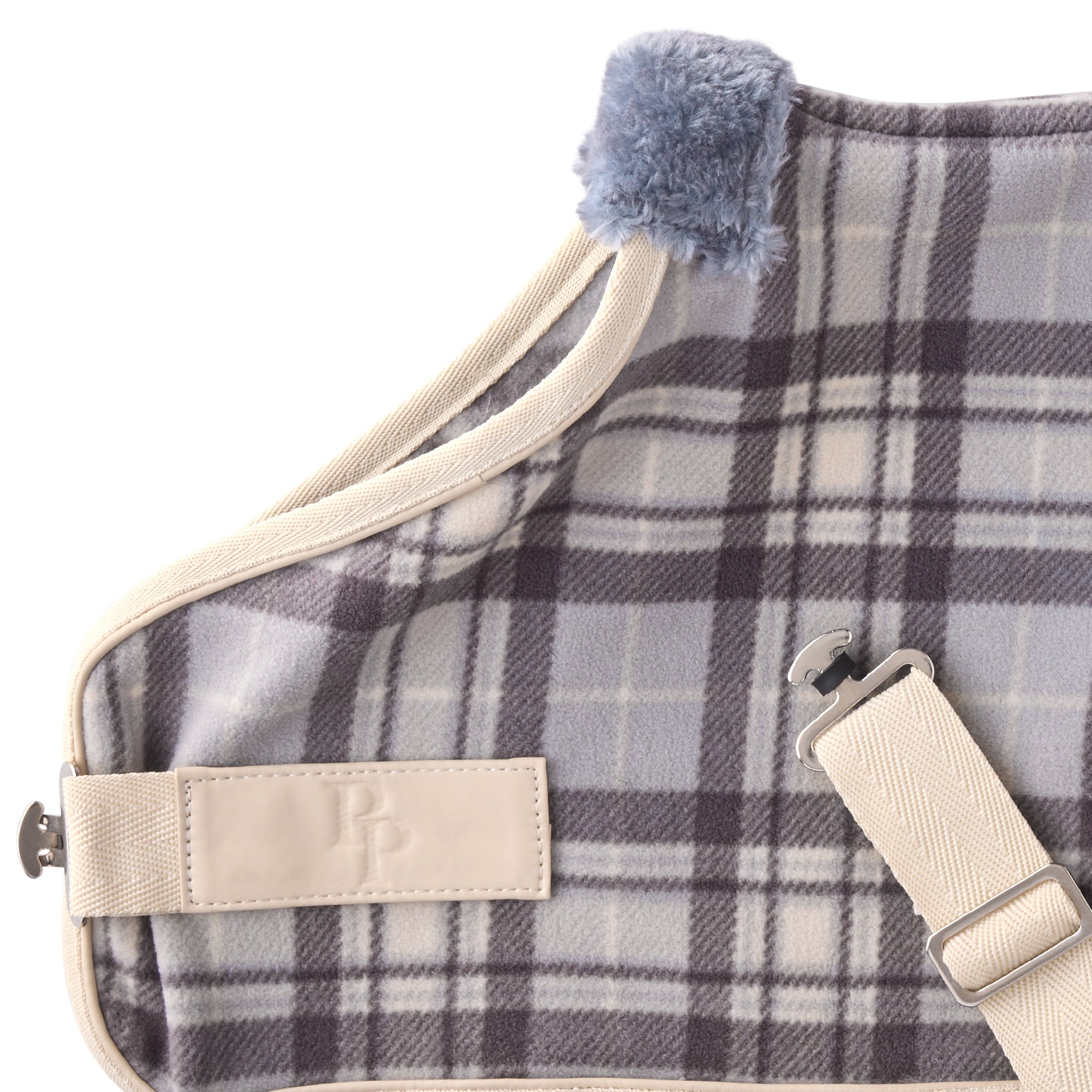 Zoom in of coat hardware and pet passion logo