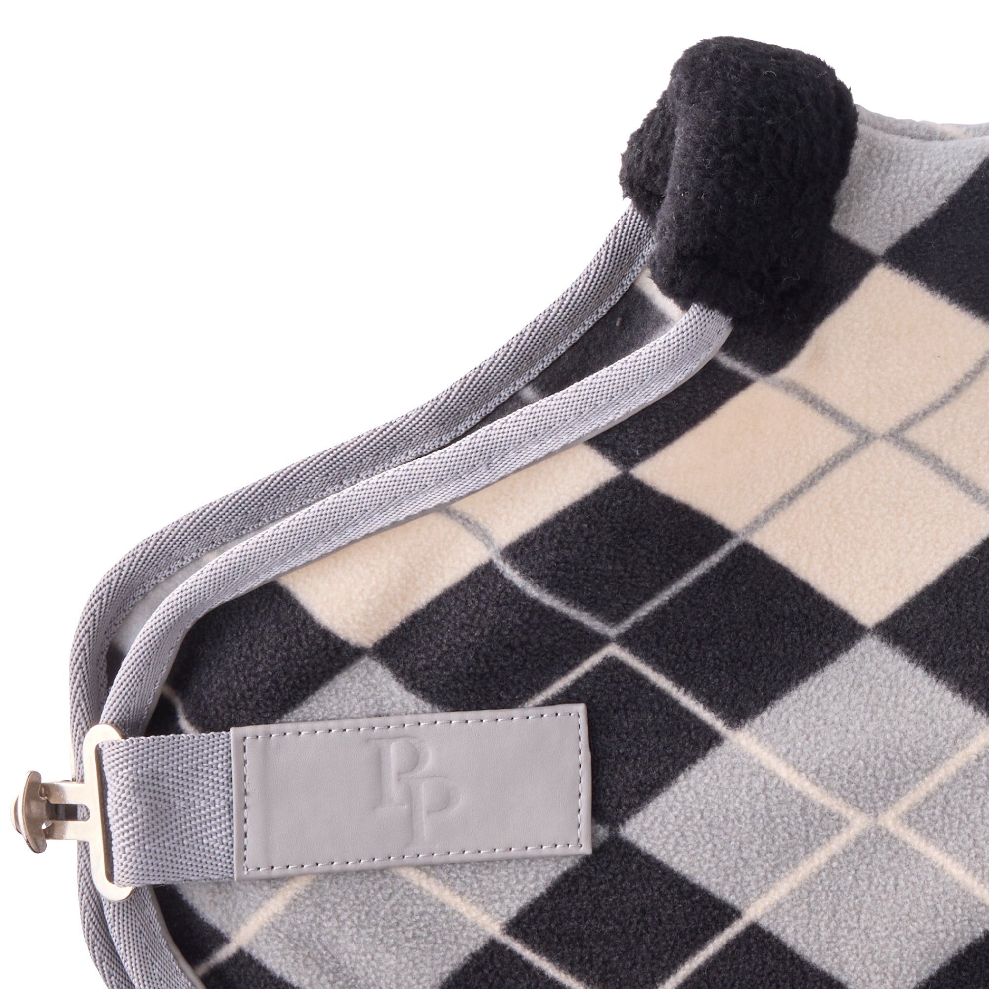 Zoom in of coat hardware and pet passion logo