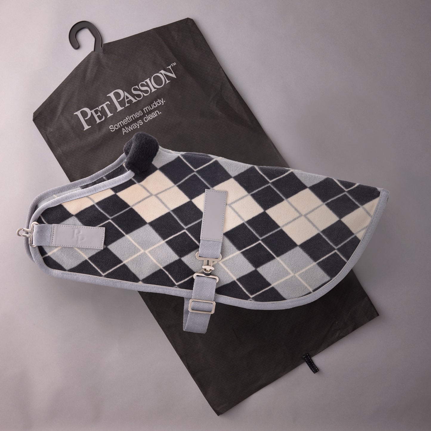 Pet passion dog coat on top of it's garment bag