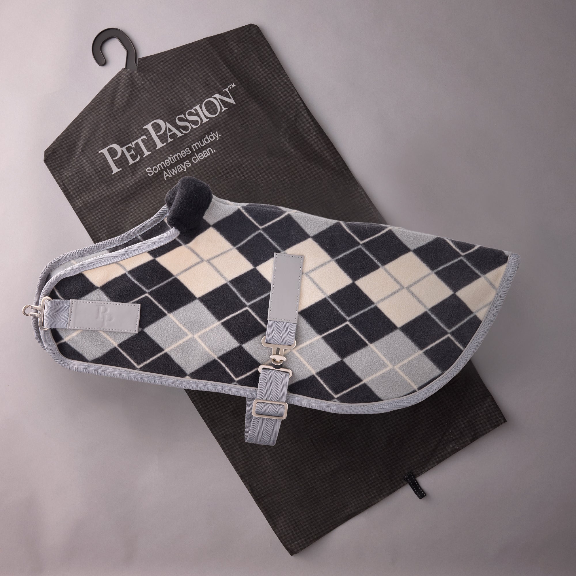 Pet passion dog coat on top of it's garment bag