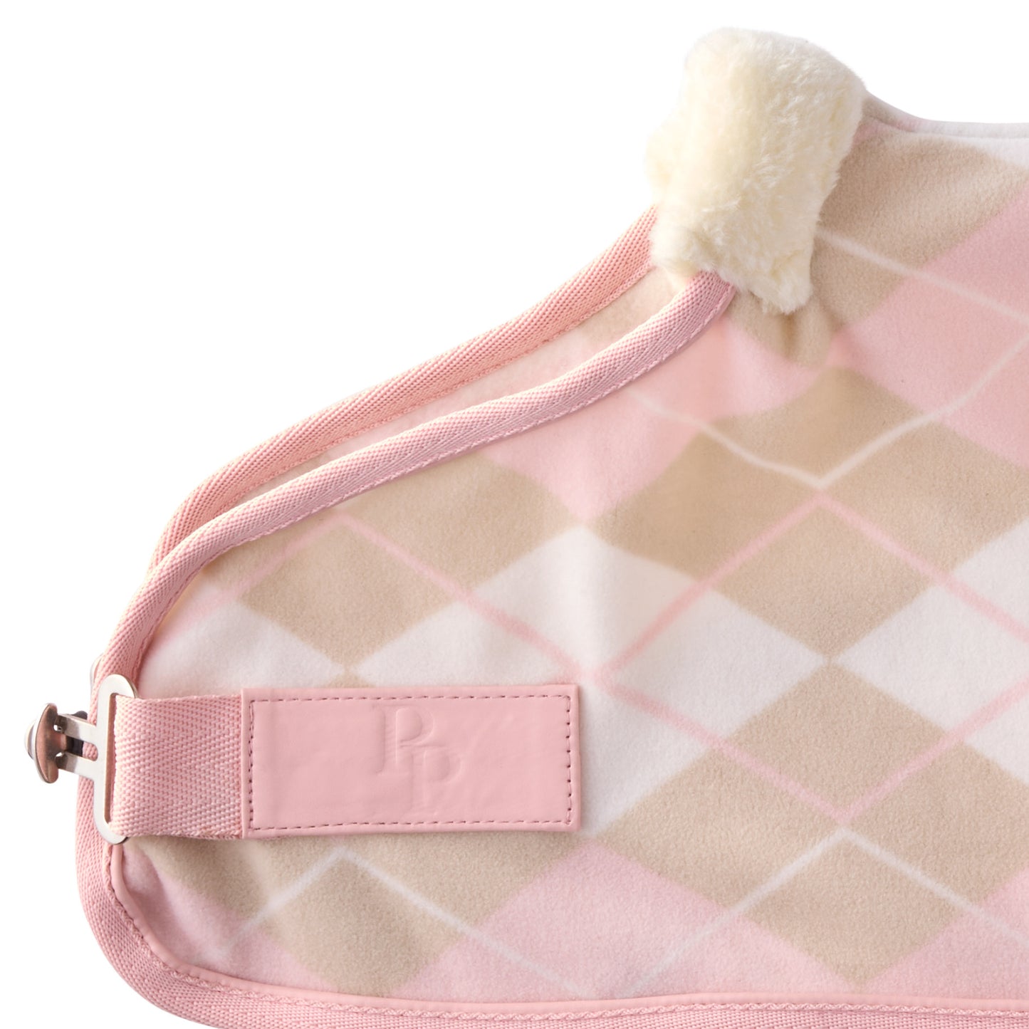 Zoom in of hardware on dog coat and pet passion label 