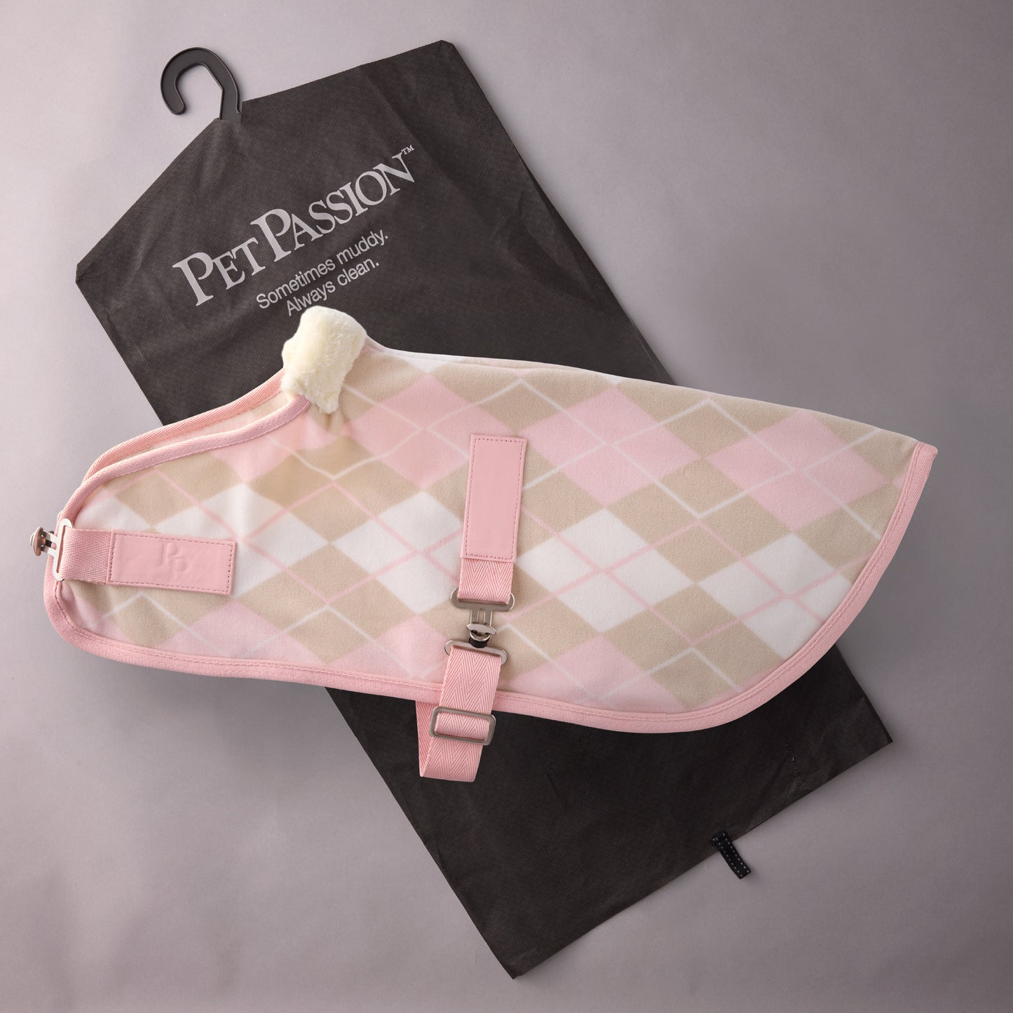 Pet passion dog coat on top of it's garmet bag