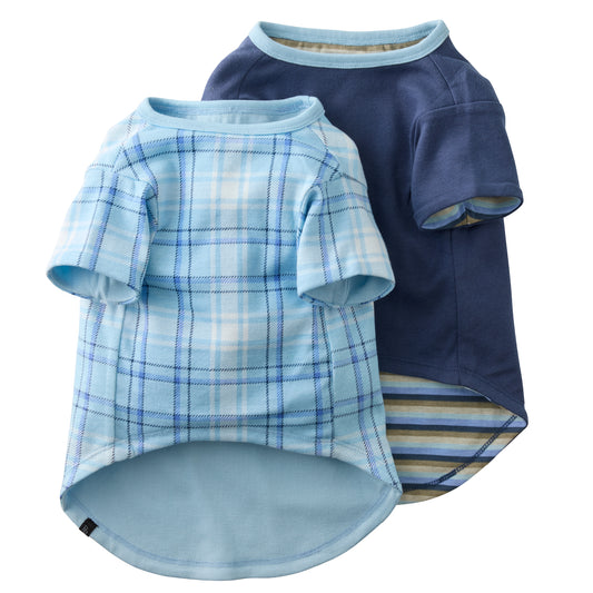 Two blue pet shirts, one plaid and one solid, on a white background