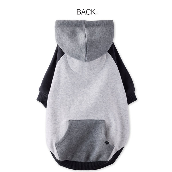 Gray dog hoodie with black sleeves on a white background