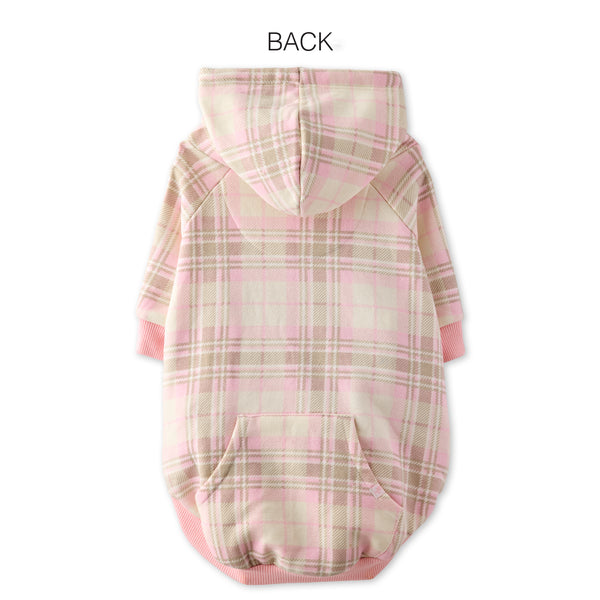Pink and beige plaid dog coat on a white background
