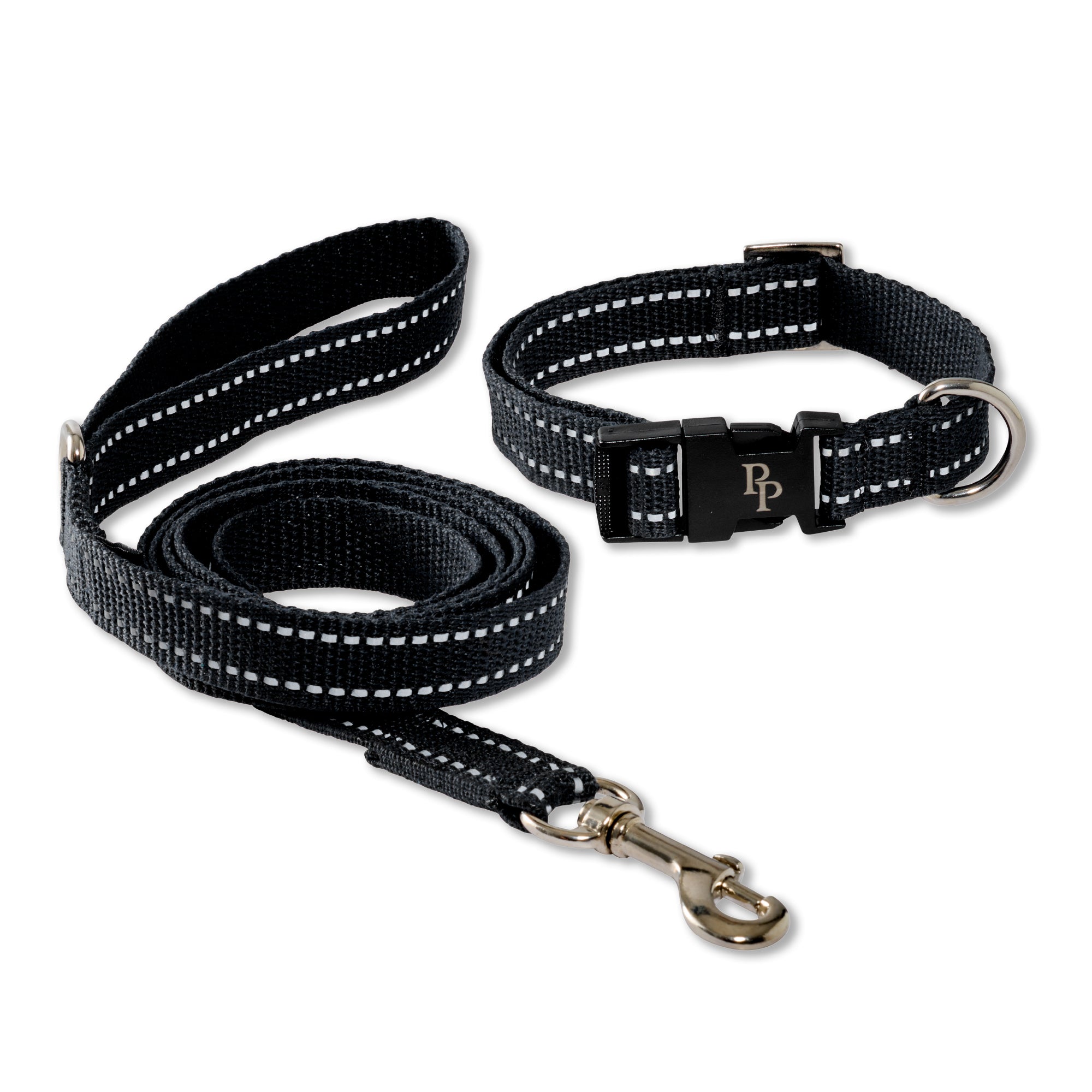 Black dog collar and leash set on a white background