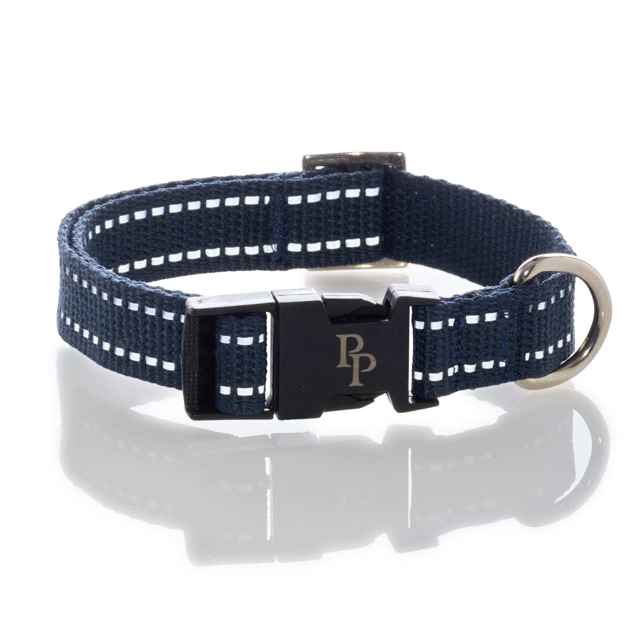 Navy blue dog collar with reflective stripes and a silver buckle on a white background