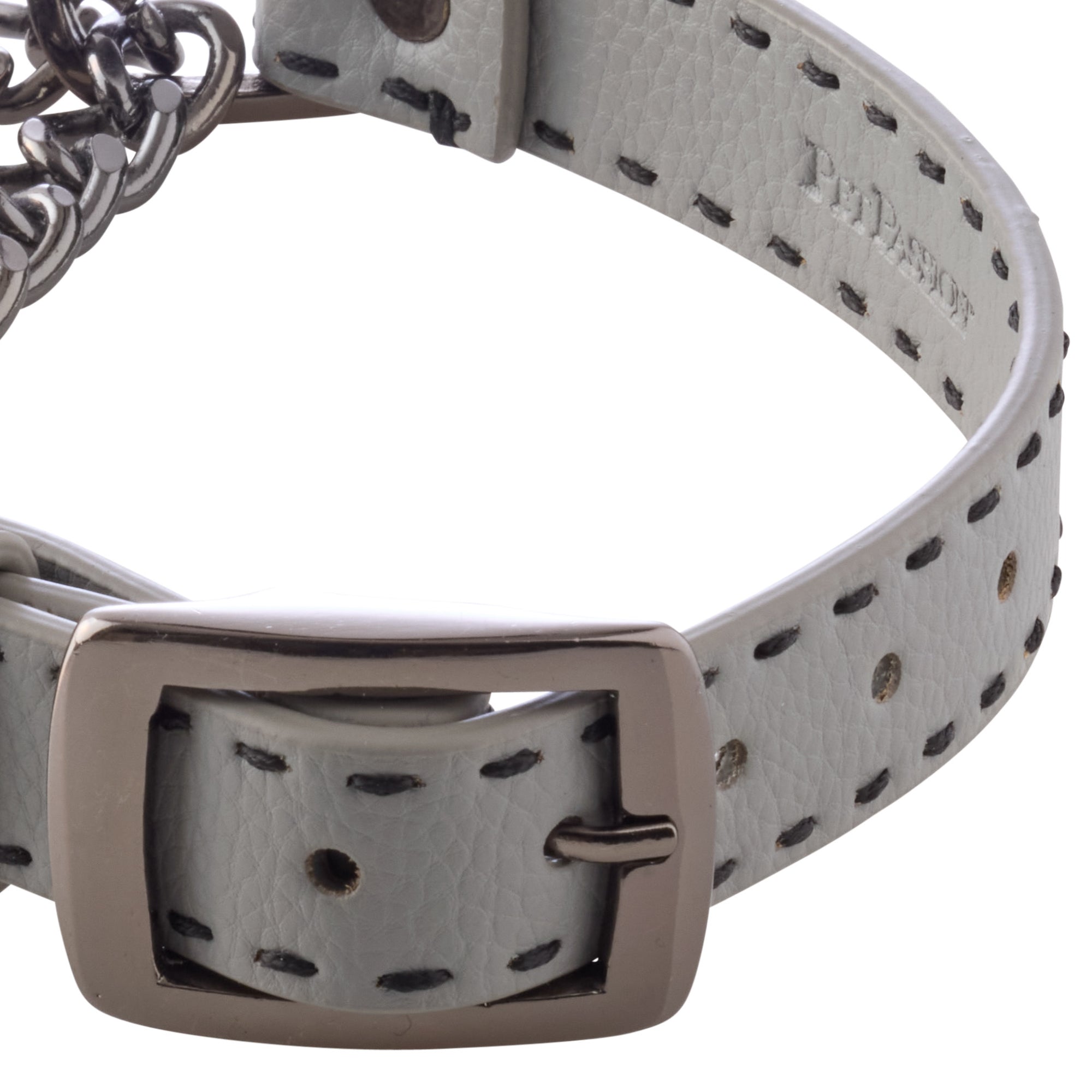 Close-up of collar buckle hardware and stitching. 
