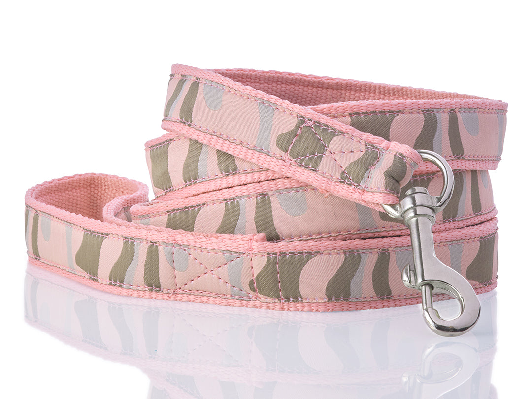 Dog leash with pink and camouflage pattern on a white background
