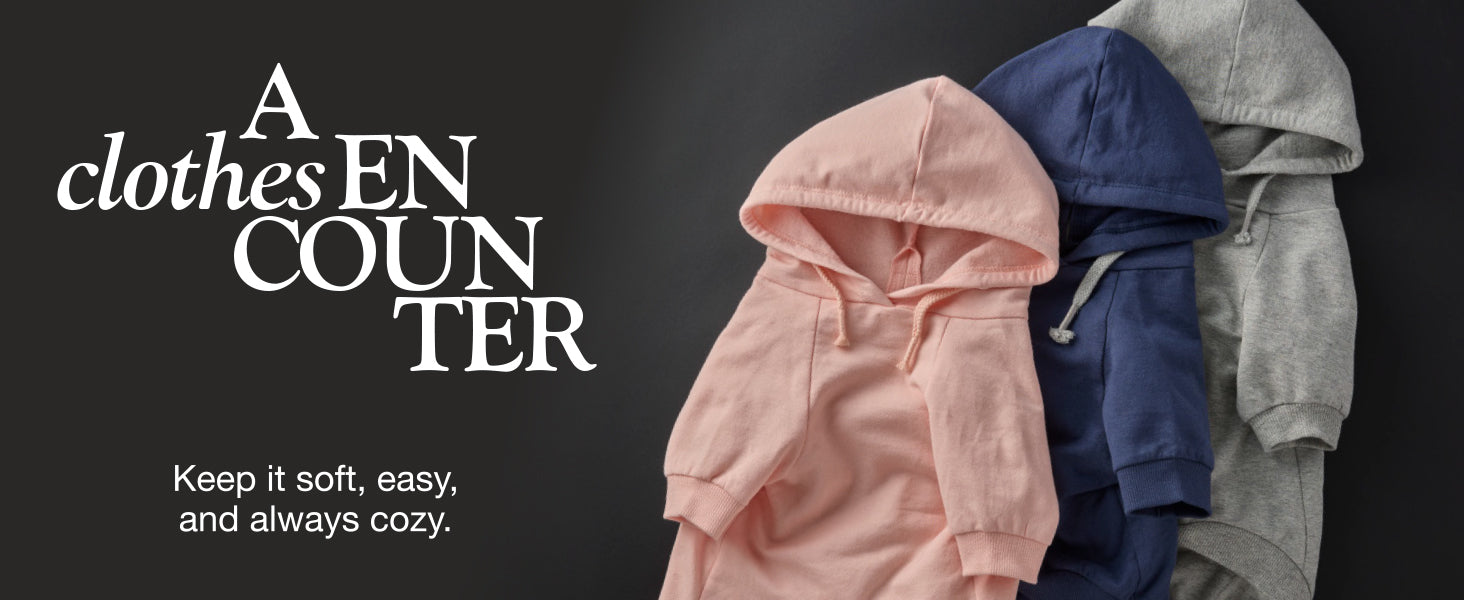 Three hoodies in pink, blue, and gray on a black background with text 'A clothes EN COUNTER' and tagline.